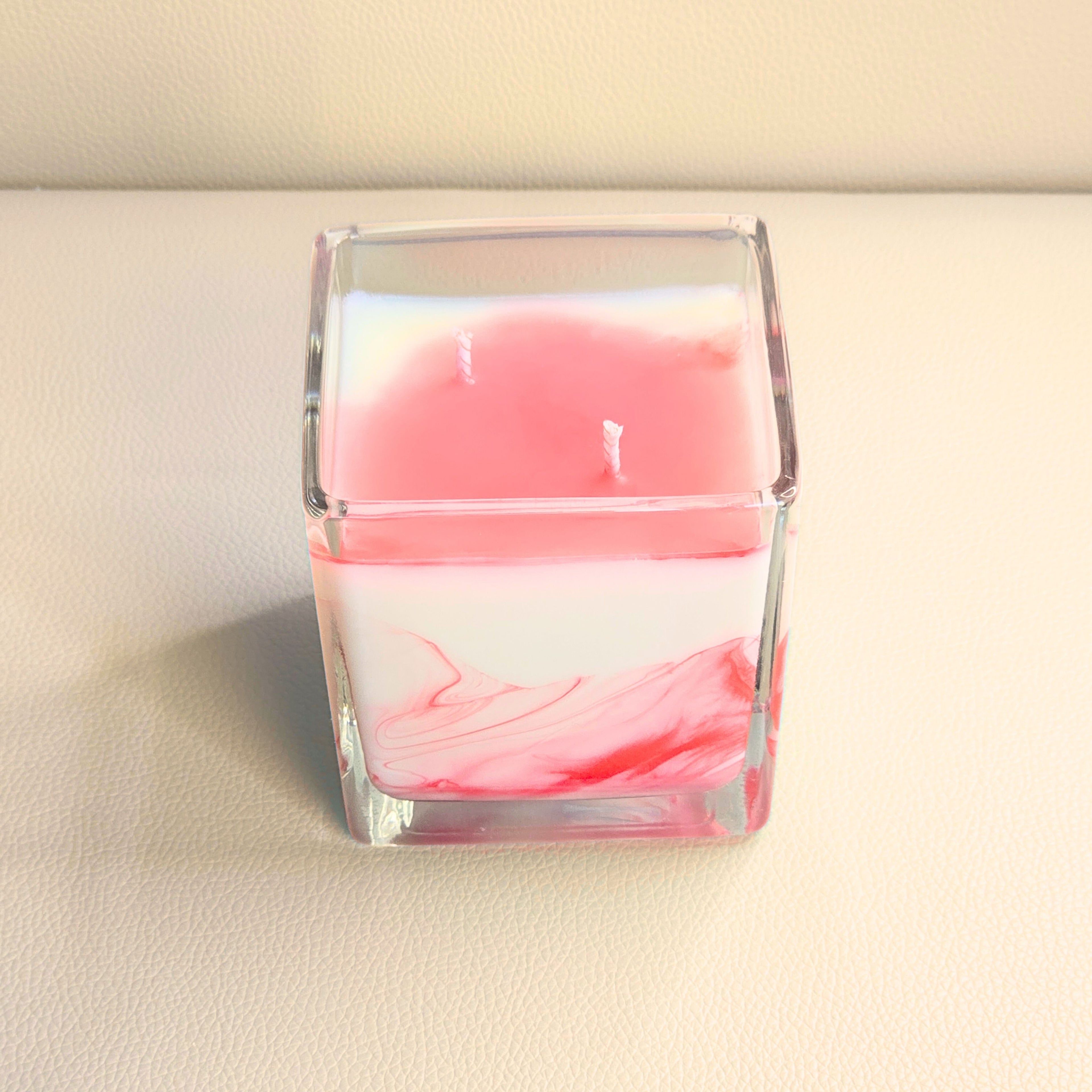 Red and white marbled candle representing passion and energy