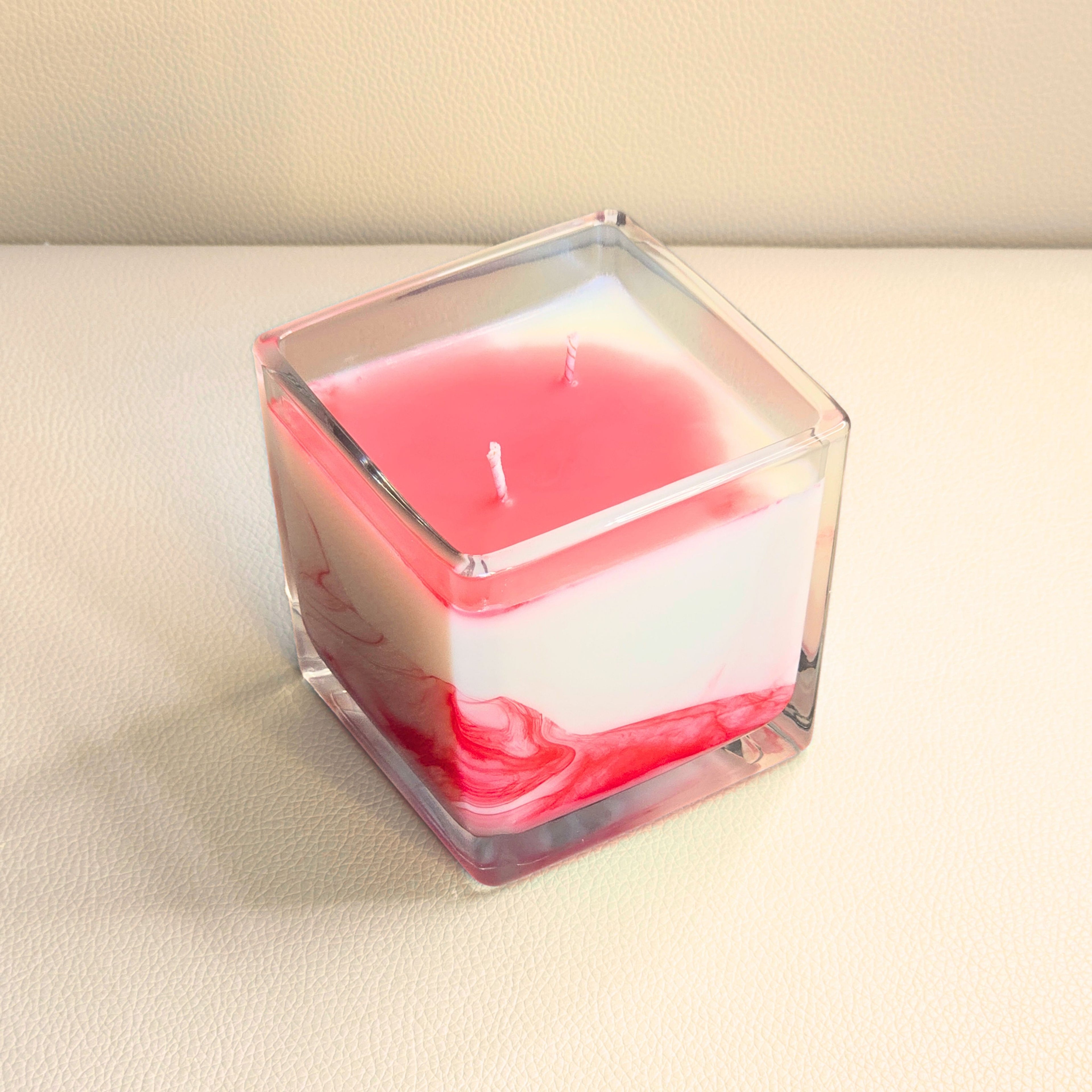 Double wick Passion Storm candle with artisanal swirl technique